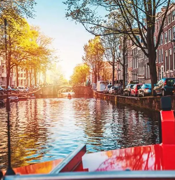 Gettyimages 929764880 Cruising And Sightseeing Along Amstel Canals On The Water In Amsterdam Netherlands