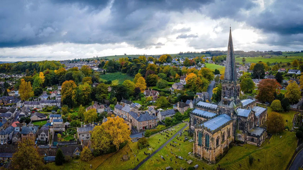 Bird's eye view of the town of Bakewell in the Peak District, showing the church, open fields and houses