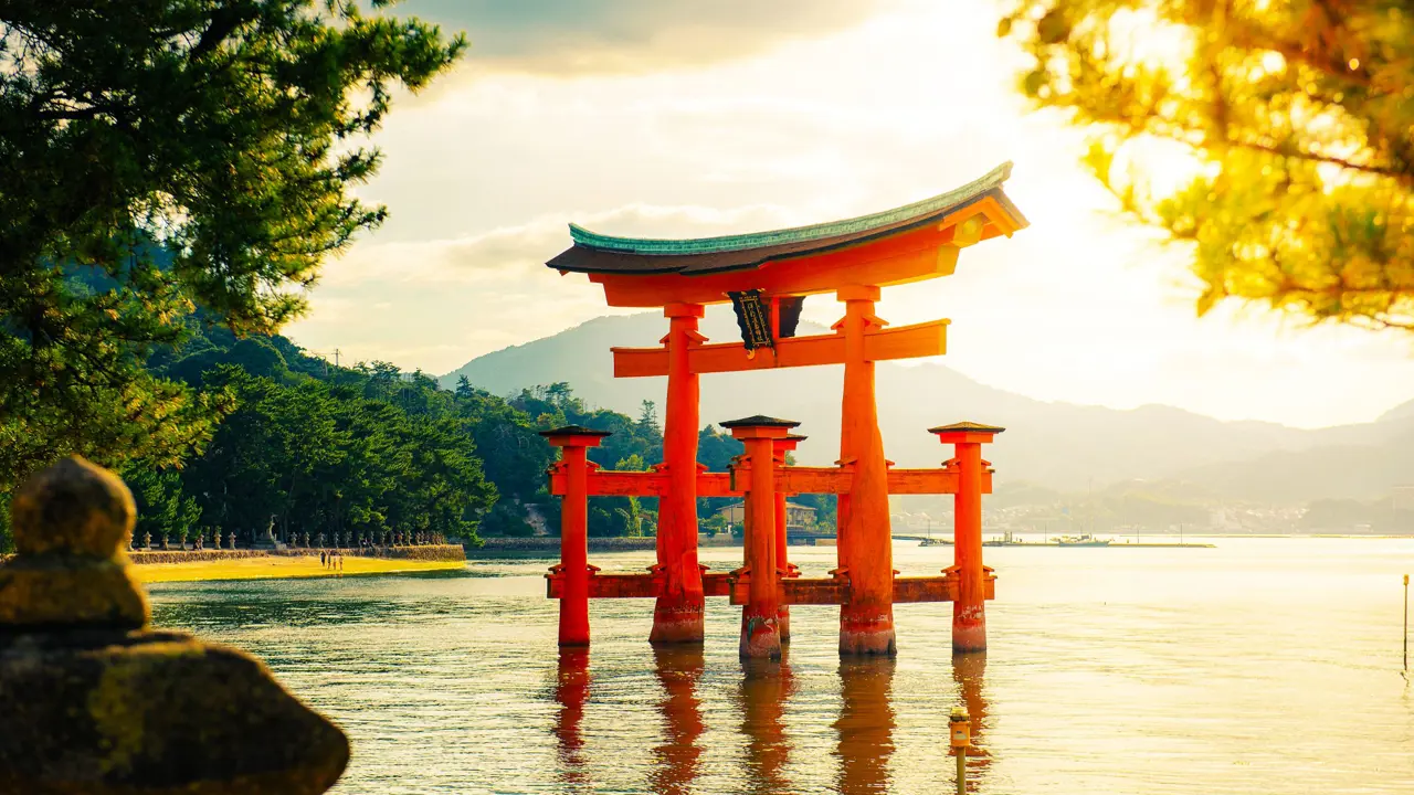 Floating Torii Gate Of Itsukushima Shrine Temple In Miyajima, Japan