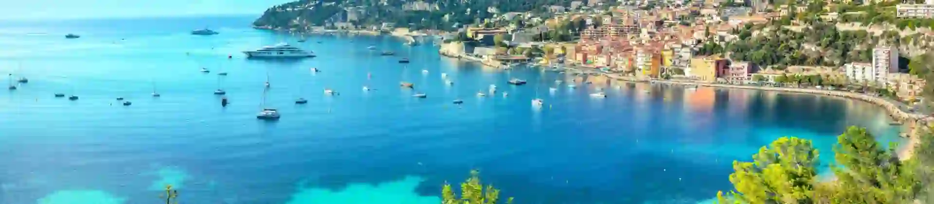 View of the Italian Riviera, showing the bright blue sea and the edge of the land