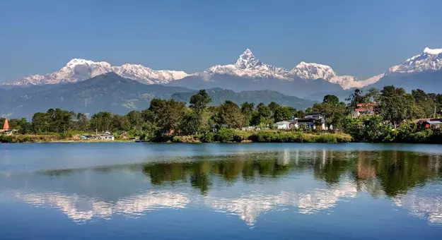 View At Annapurna Mountain Range And Its Reflection In Phewa Lake In Pokhara Nepal