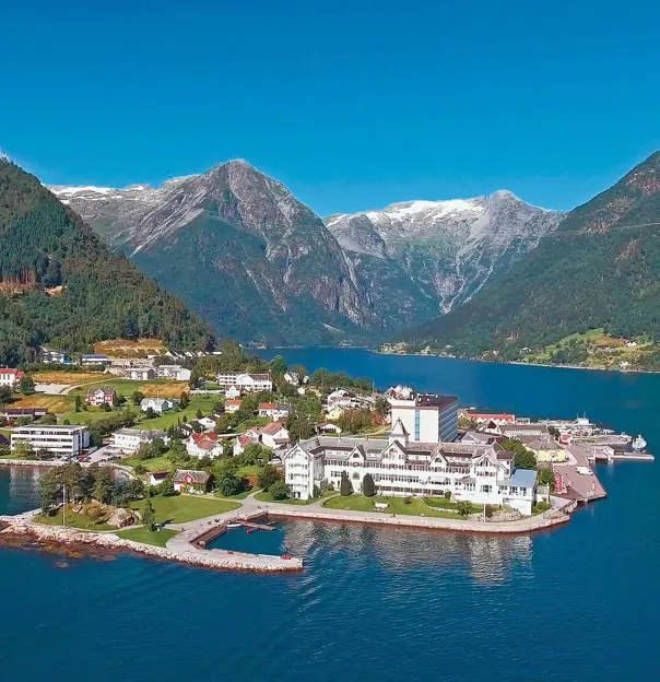 Town amongst the fjords of Norway and its mountains