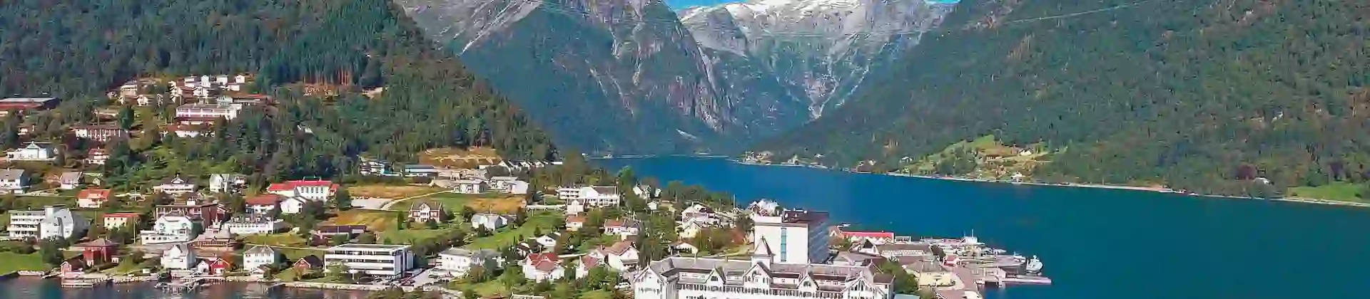 Town amongst the fjords of Norway and its mountains