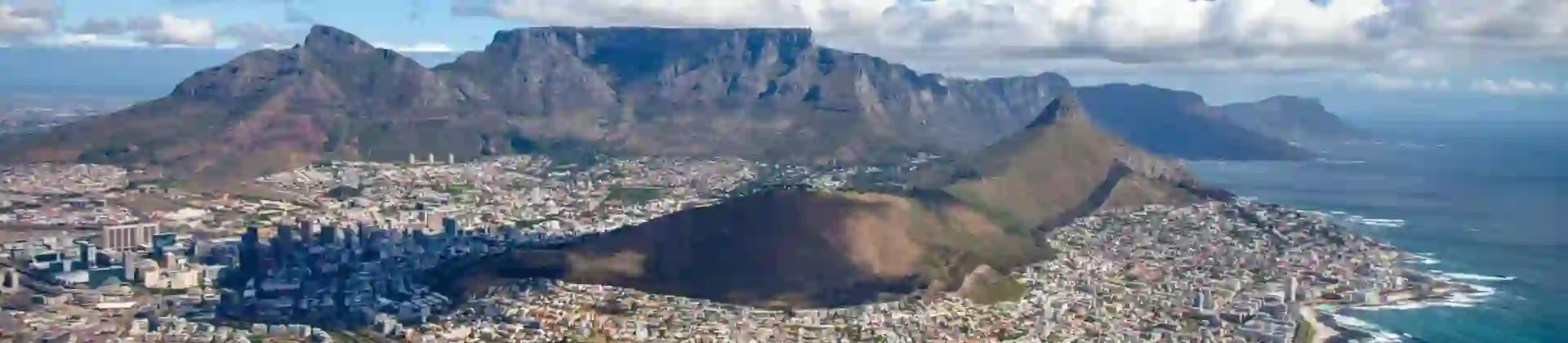 Aerial view of Cape Town with Table Mountain and the coastline in the background