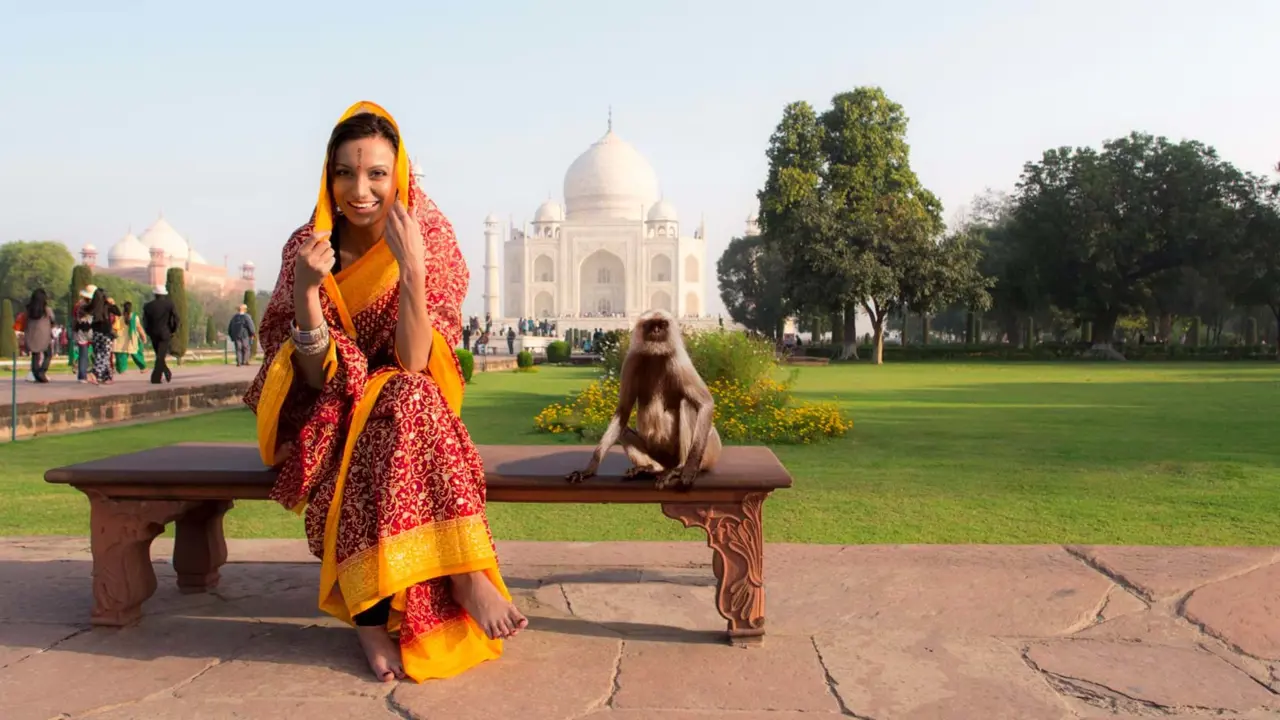 Woman with Monkey Outside Taj Mahal India