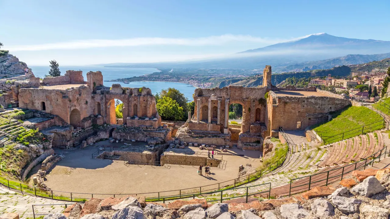 View of Taormina with Theatre of Taormina and Mount Etna, Sicily, Italy 