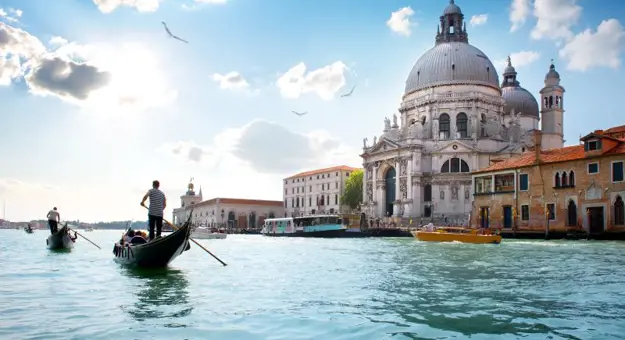 Gondola On Grand Canal Venice with view of the Salute Church