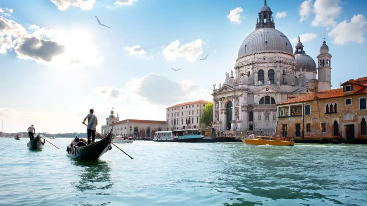 Gondola On Grand Canal Venice with view of the Salute Church