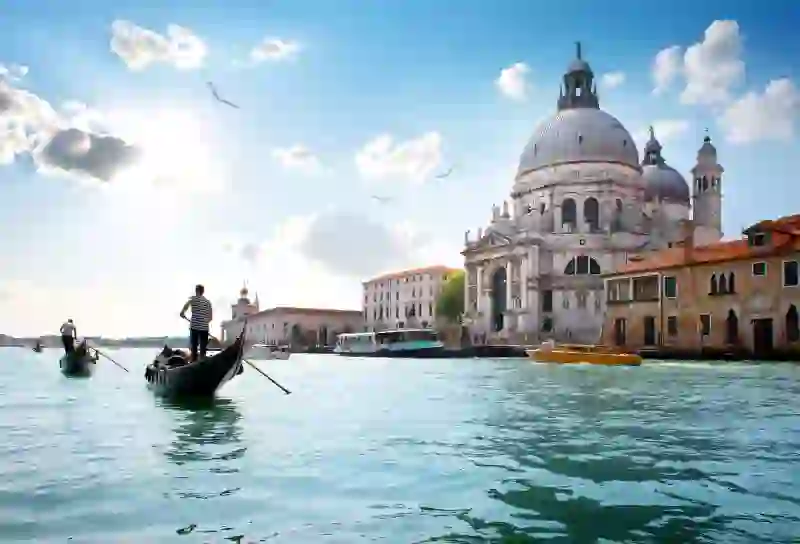 Gondola On Grand Canal Venice with view of the Salute Church