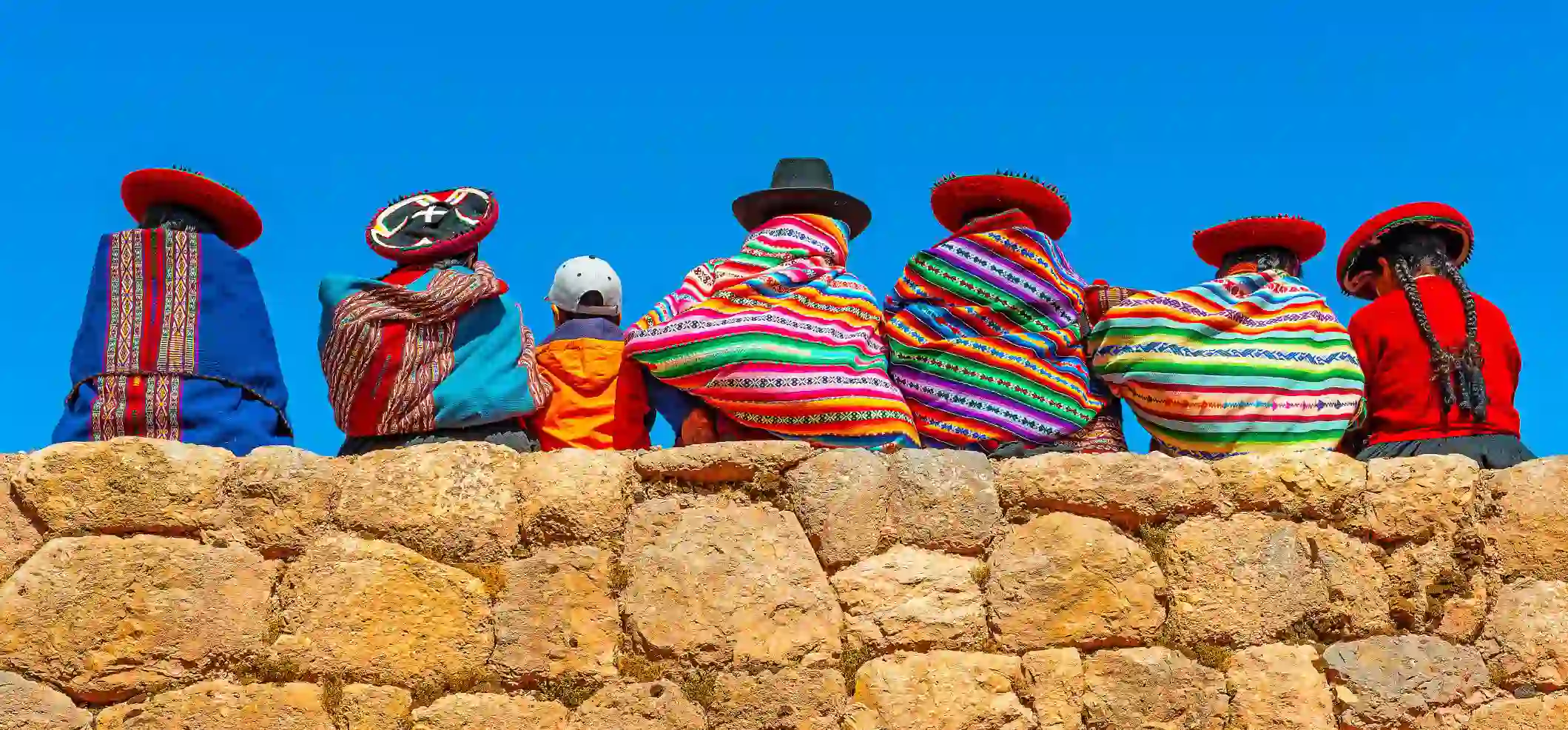 Peruvian People On Wall