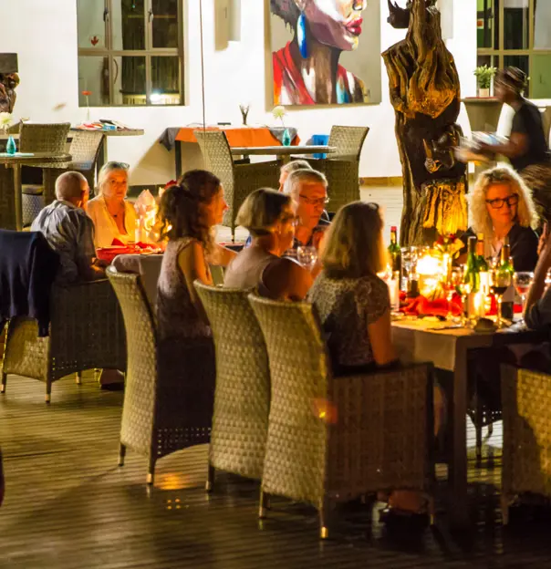 People Gathered Round Table in South Africa