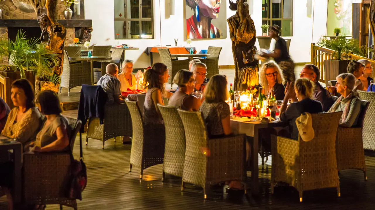 People Gathered Round Table in South Africa