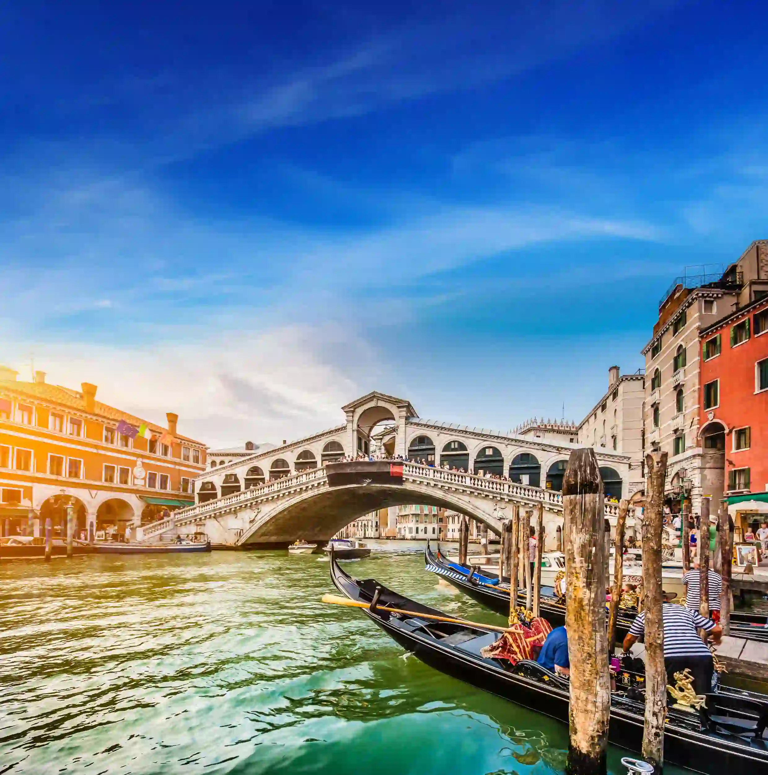 Rialto Bridge, Venice with gondala boats in the forefront