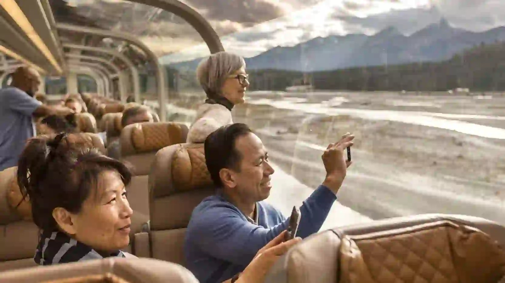 Couple Taking Photo On Rocky Mountaineer