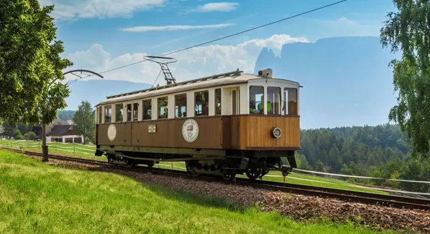 Train moving along the Renon Railway