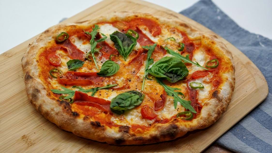 Margherita Pizza On Table In Naples