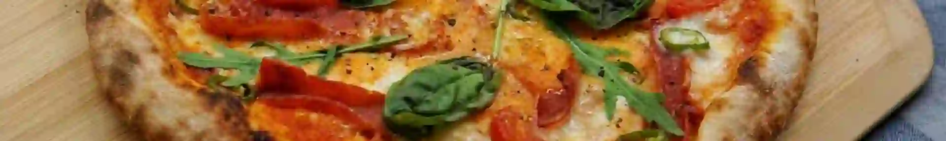 Margherita Pizza On Table In Naples