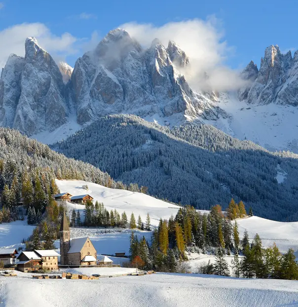 Dolomites in the snow in St Magdalena, Italy