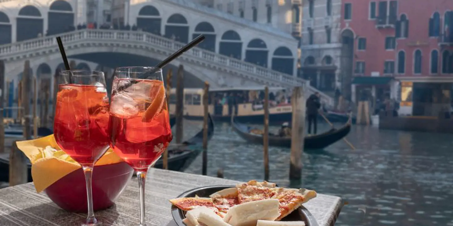 Food And Drink with a view of Rialto Bridge and the canal