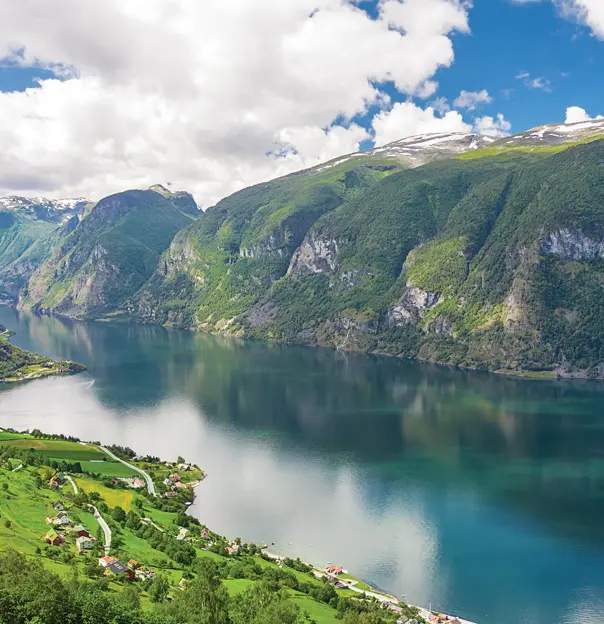 Fjord in Norway surrounded by mountains 