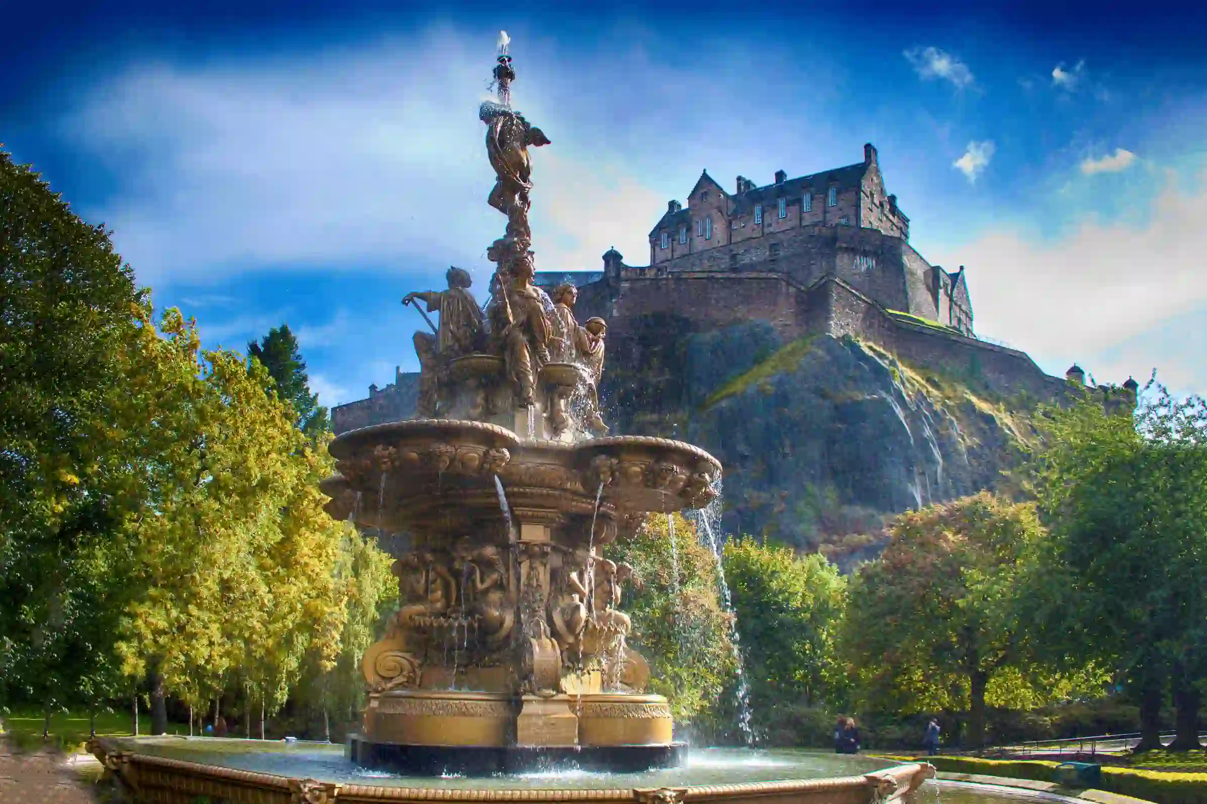 Shot of Edinburgh Castle on the top of the hill and Ross fountain in the forefront