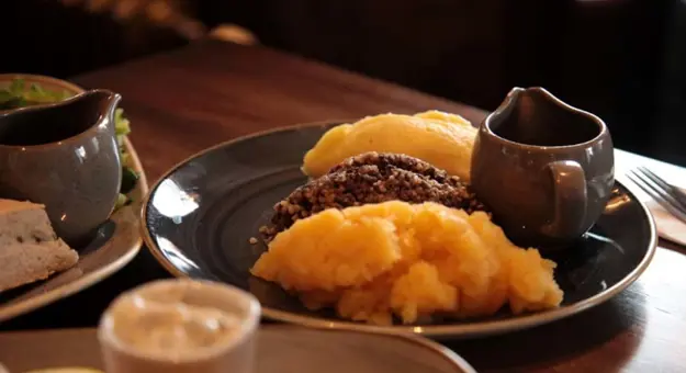 Plate of Haggis with a jug of gravy