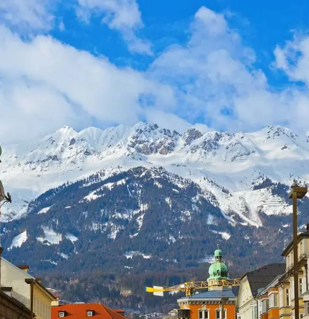 View of a snowy mountain from the Old Town in Innsbruck, Austria 