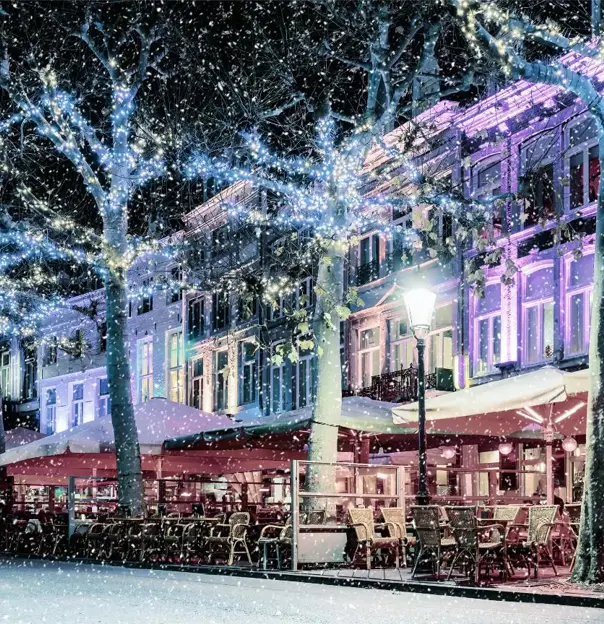 Christmas lights and snow on the Vrijthof Square in Maastricht