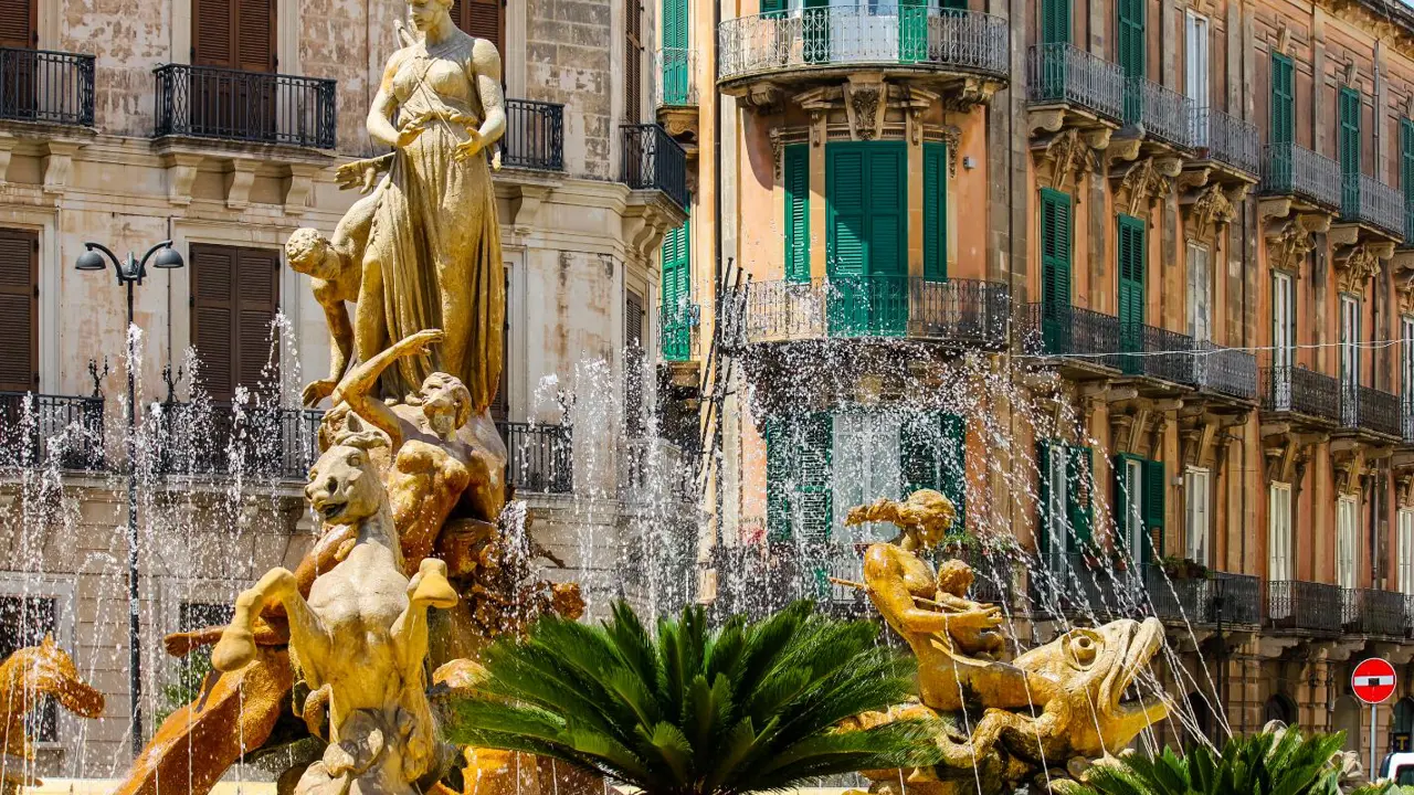 Fountain with ancient statues, Syracuse, Sicily, Italy
