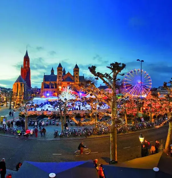 Vrijthof Square in Maastricht decorated for Christmas with festive lights and market stalls