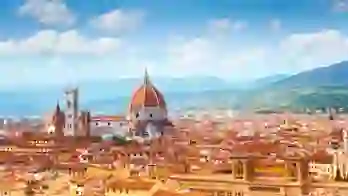 Panoramic view of Florence, Italy, with the Cathedral of Santa Maria del Fiore rising amongst the terracotta rooftops
