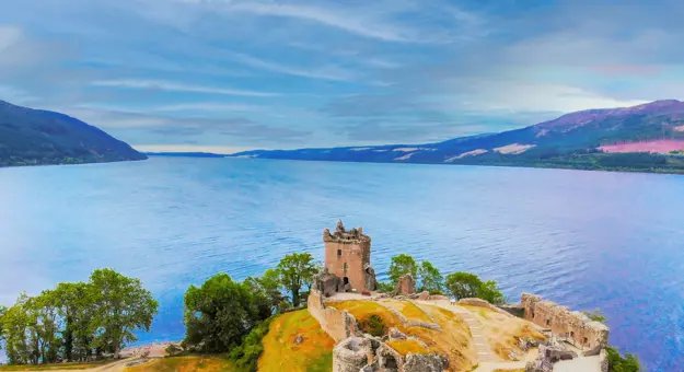 High angle shot of Loch Ness And Urquhart Castle