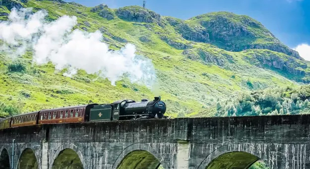 Steam train going along the West Highland Rail, Scotland